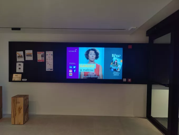 &Eacute;cran d'affichage dynamique salle d'attente notaire Snyers