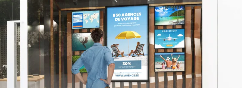 Les avantages des &eacute;crans d'affichage dynamique et des porte-affiches pour les agences de voyage