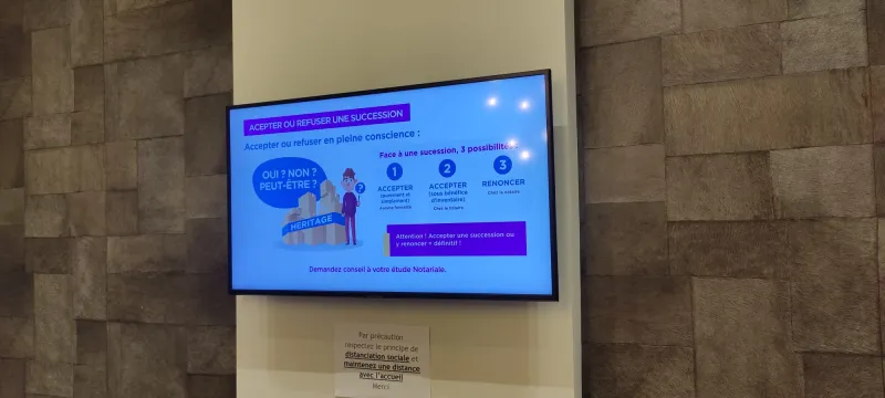 Ecran salle d'attente &eacute;tude de notaires &agrave; Wavre