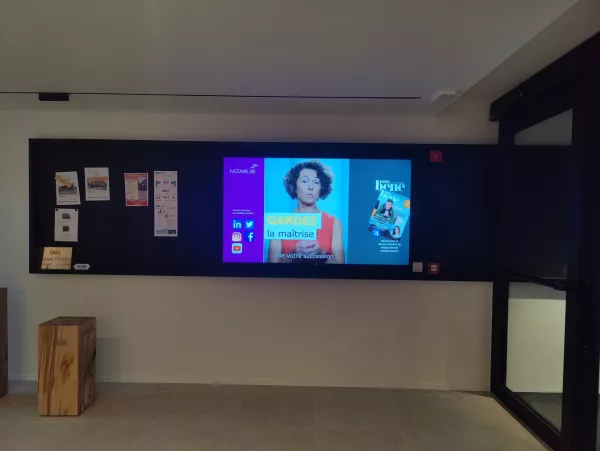 &Eacute;cran d'affichage dynamique salle d'attente notaire Snyers